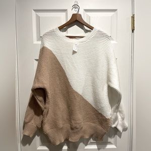 Women’s oversized tan and cream sweater. New with tags
